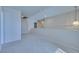 Carpeted loft space featuring modern lighting at 5854 Heather Marie Dr, Las Vegas, NV 89110