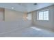 Well-lit loft area with neutral walls and carpet at 5854 Heather Marie Dr, Las Vegas, NV 89110