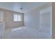 Spacious room with natural light and neutral carpet at 5854 Heather Marie Dr, Las Vegas, NV 89110