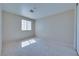 Bright room with neutral walls and carpet at 5854 Heather Marie Dr, Las Vegas, NV 89110