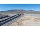 An aerial view showcasing the property's proximity to I-215, connecting to US-95 & I-15, providing convenient travel routes at 6440 N Bruce St, North Las Vegas, NV 89086