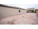 Spacious backyard with extended patio and block wall in a well-maintained property at 6440 N Bruce St, North Las Vegas, NV 89086