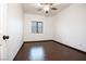 A cozy bedroom featuring tile floors and a window at 6440 N Bruce St, North Las Vegas, NV 89086