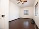 Bedroom featuring tile floors and a window at 6440 N Bruce St, North Las Vegas, NV 89086