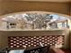 Cozy balcony with views of well-maintained community landscaping and seating at 7400 W Flamingo Rd # 2058, Las Vegas, NV 89147