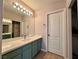 Well-lit bathroom featuring a modern vanity with ample counter space, sleek fixtures, and updated lighting at 7400 W Flamingo Rd # 2058, Las Vegas, NV 89147