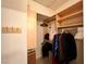 Walk-in closet with custom shelving and storage solutions for organizing clothes and accessories at 7400 W Flamingo Rd # 2058, Las Vegas, NV 89147