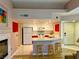 Bright kitchen features white cabinets, modern appliances, and a convenient breakfast bar for casual dining at 7400 W Flamingo Rd # 2058, Las Vegas, NV 89147
