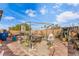 Spacious backyard with a tiled patio area, perfect for outdoor entertaining and relaxation at 7832 Hamilton Pool Dr, Las Vegas, NV 89113