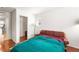 Comfortable bedroom with ample natural light and hardwood floors at 7832 Hamilton Pool Dr, Las Vegas, NV 89113