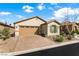 Charming single-story home with a well-manicured yard and a two-car garage at 7832 Hamilton Pool Dr, Las Vegas, NV 89113