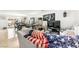 Spacious living room with tile floors, TV and furniture at 7832 Hamilton Pool Dr, Las Vegas, NV 89113