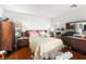 Cozy main bedroom featuring a comfortable bed, neutral walls, and ample natural light at 7832 Hamilton Pool Dr, Las Vegas, NV 89113