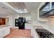 Spacious kitchen with granite countertops, stainless steel appliances, tile backsplash, and center island at 8240 Campana Dr, Las Vegas, NV 89147