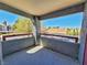 Balcony with a view of a residential neighborhood and mature trees at 8600 W Charleston Blvd # 2089, Las Vegas, NV 89117