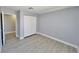 Bedroom with light gray walls, white trim, and closet at 8600 W Charleston Blvd # 2089, Las Vegas, NV 89117