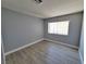 Bedroom featuring neutral walls, white trim, and a window at 8600 W Charleston Blvd # 2089, Las Vegas, NV 89117