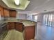 The modern kitchen has granite countertops, stainless appliances, and wood cabinets at 8600 W Charleston Blvd # 2089, Las Vegas, NV 89117