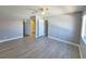 Serene main bedroom featuring light gray walls, light floors, and ample closet space at 8600 W Charleston Blvd # 2089, Las Vegas, NV 89117