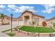 Attractive single-Gathering home with a three-car garage, well-kept lawn, and stone accents at 8624 Burning Hide Ave, Las Vegas, NV 89143