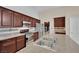 Modern kitchen featuring stainless steel appliances and wood cabinets at 8624 Burning Hide Ave, Las Vegas, NV 89143