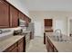 Well-equipped kitchen with stainless steel appliances and granite countertops at 8624 Burning Hide Ave, Las Vegas, NV 89143
