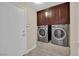 Convenient laundry room with modern washer and dryer at 8624 Burning Hide Ave, Las Vegas, NV 89143