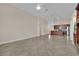 Wide view of the living room with kitchen, bar, and door to the outside at 8624 Burning Hide Ave, Las Vegas, NV 89143