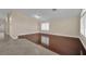 Spacious living room with hardwood floors and plantation shutters, filled with natural light at 8624 Burning Hide Ave, Las Vegas, NV 89143