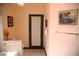 Cozy bathroom featuring a toilet and dark trim at 9113 Anchor Cove Ct, Las Vegas, NV 89117