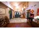 Foyer with wood flooring, marble entrance, and staircase at 9113 Anchor Cove Ct, Las Vegas, NV 89117