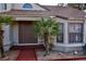 Inviting front entrance featuring a decorative security door, tiled walkway, and desert landscaping at 9113 Anchor Cove Ct, Las Vegas, NV 89117