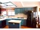 Well-equipped kitchen boasting updated cabinets, countertops, and stainless steel appliances at 9113 Anchor Cove Ct, Las Vegas, NV 89117
