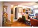 Cozy living room featuring hardwood floors and a quaint reading nook with built-in shelving at 9113 Anchor Cove Ct, Las Vegas, NV 89117
