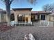 Fenced yard with privacy fence, patio area, and desert landscaping at 9449 Grand Mesa Dr, Las Vegas, NV 89134
