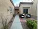 Inviting front patio with outdoor seating on a peaceful walkway at 9449 Grand Mesa Dr, Las Vegas, NV 89134