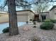 Charming single-story home with desert landscaping and a two-car garage at 9449 Grand Mesa Dr, Las Vegas, NV 89134