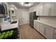 Beautiful kitchen featuring quartz counters, stainless steel appliances, and updated cabinets at 9449 Grand Mesa Dr, Las Vegas, NV 89134