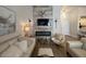 Stylish living room features modern fireplace and comfortable seating at 9449 Grand Mesa Dr, Las Vegas, NV 89134