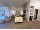 Open living room featuring a fireplace, wine bar, and ample seating at 9449 Grand Mesa Dr, Las Vegas, NV 89134