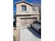 Charming home featuring an attached two car garage and well-maintained landscaping at 10524 Congaree St, Las Vegas, NV 89141
