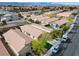 Aerial view highlighting the community layout, featuring multiple homes, well-maintained landscaping, and convenient street access at 11007 Vallerosa St, Las Vegas, NV 89141