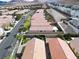 Extensive aerial view depicting orderly street arrangements, and landscaped residences, forming a well-managed residential environment at 11007 Vallerosa St, Las Vegas, NV 89141