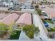 Aerial view of a single-story home with a spacious driveway and a low-maintenance backyard, offering privacy and convenience at 11007 Vallerosa St, Las Vegas, NV 89141