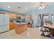 Bright kitchen with an island, stainless steel appliances, and a dining area at 11007 Vallerosa St, Las Vegas, NV 89141