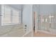 Bathroom with a separate tub and glass-door shower at 1112 Bower Basin St, Las Vegas, NV 89144