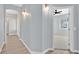 Hallway featuring modern lighting and an archway entrance at 1112 Bower Basin St, Las Vegas, NV 89144