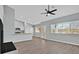 Bright, open living space featuring a modern fireplace, updated flooring, and natural light at 1112 Bower Basin St, Las Vegas, NV 89144
