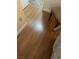 Bedroom showcasing the wood-look laminate flooring with a chair and bed at 1112 Observation Dr # 102, Las Vegas, NV 89128