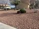 Condominium complex with mature trees and desert landscaping at 1112 Observation Dr # 102, Las Vegas, NV 89128